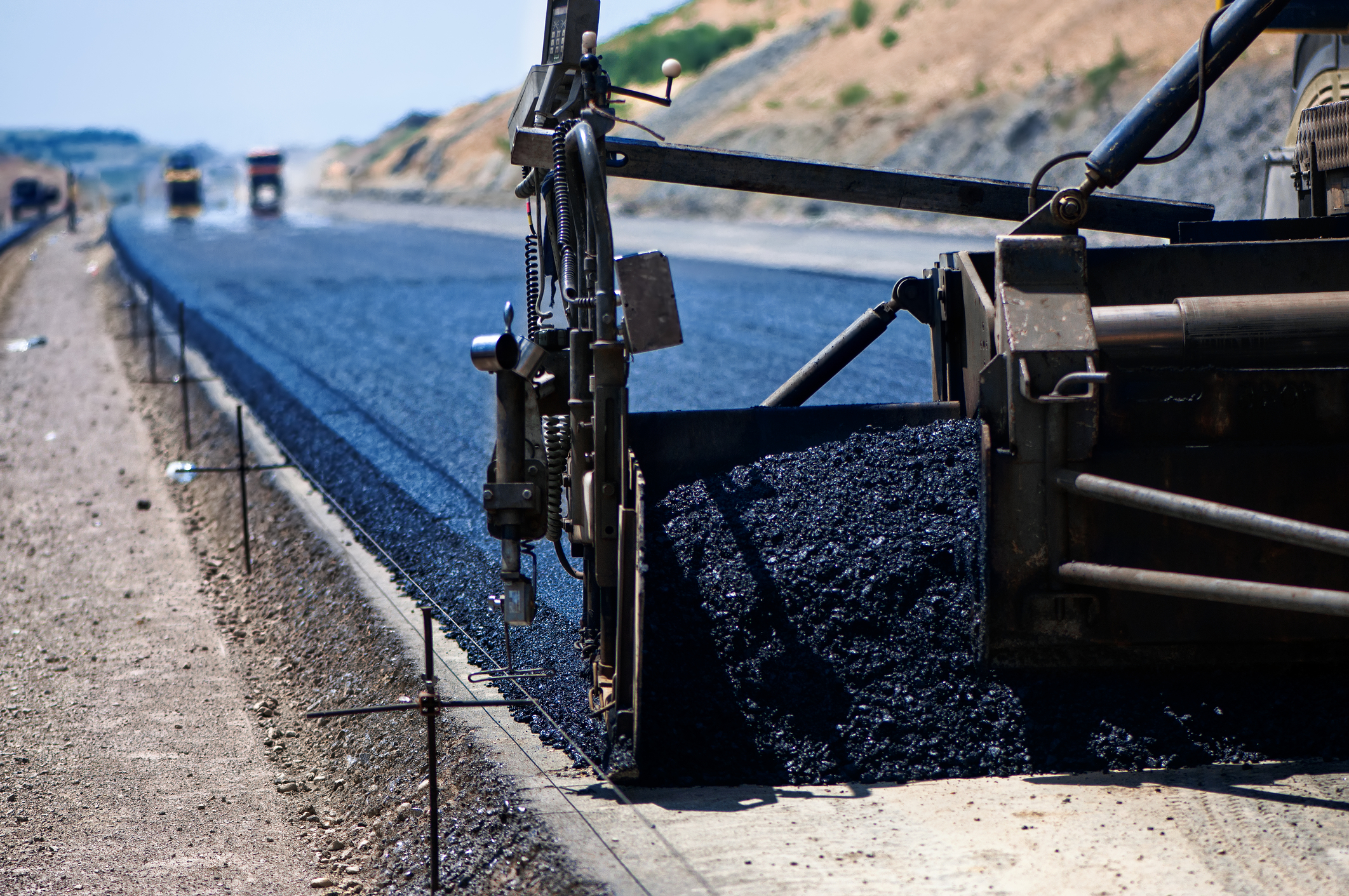New Asphalt Coming Out of Paver Blacktop LIC